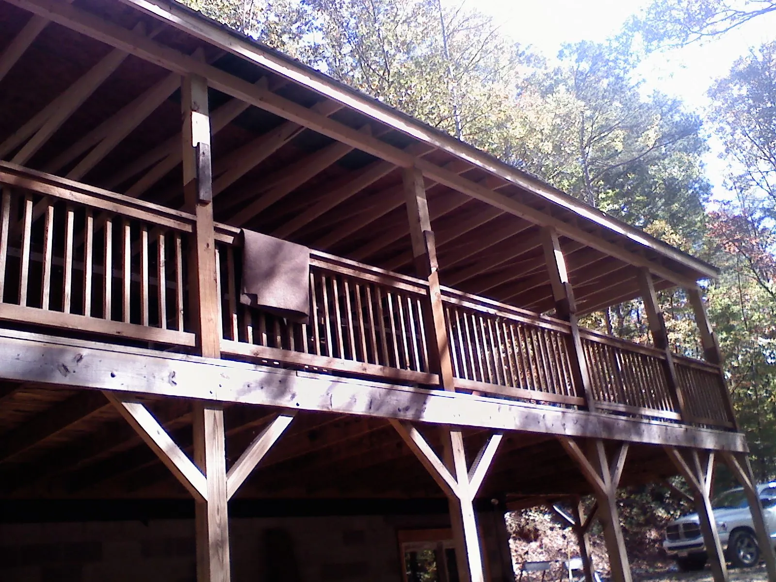 Timber framing under a new elevated porch and deck — Roof Leak Repair in New Windsor by Roofing Brothers